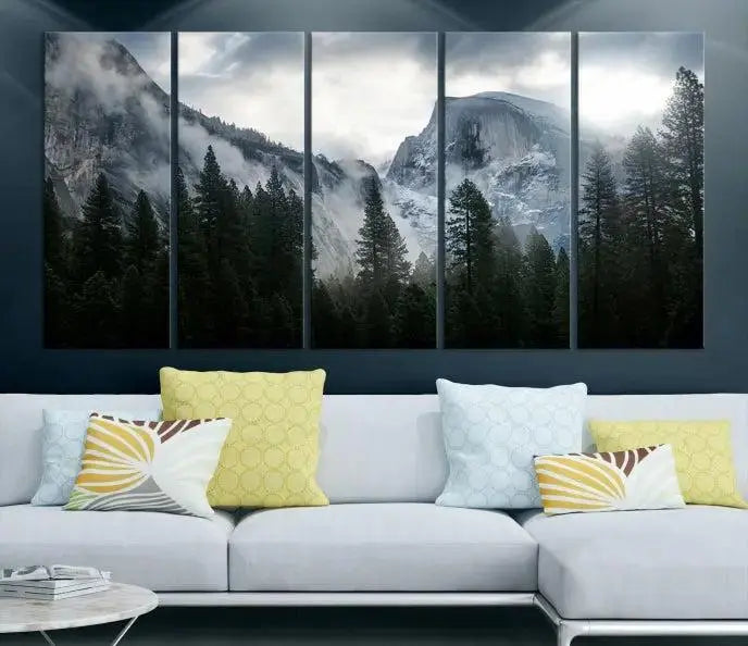 A captivating wall art depicting foggy mountains and the iconic El Capitan from Yosemite National Park graces the wall, infusing the living room with a natural touch.