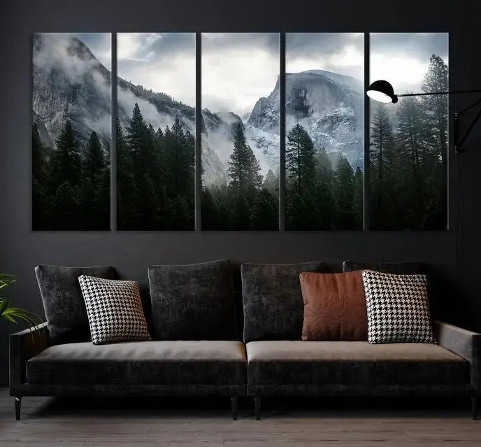 A captivating wall art depicting foggy mountains and the iconic El Capitan from Yosemite National Park graces the wall, infusing the living room with a natural touch.