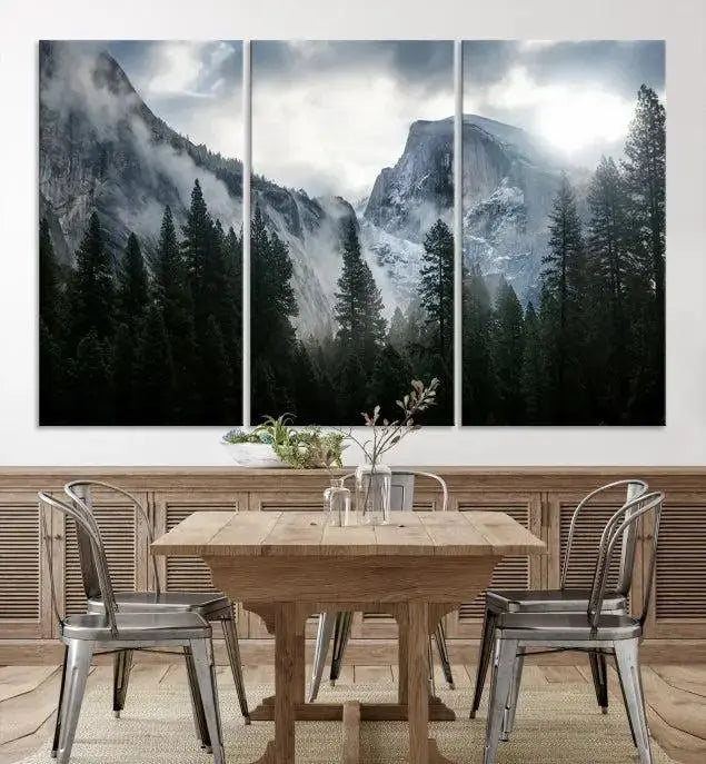 A captivating wall art depicting foggy mountains and the iconic El Capitan from Yosemite National Park graces the wall, infusing the living room with a natural touch.