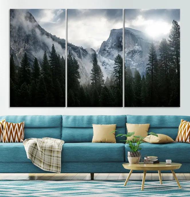 A captivating wall art depicting foggy mountains and the iconic El Capitan from Yosemite National Park graces the wall, infusing the living room with a natural touch.