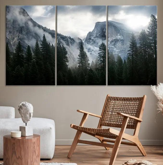 A captivating wall art depicting foggy mountains and the iconic El Capitan from Yosemite National Park graces the wall, infusing the living room with a natural touch.