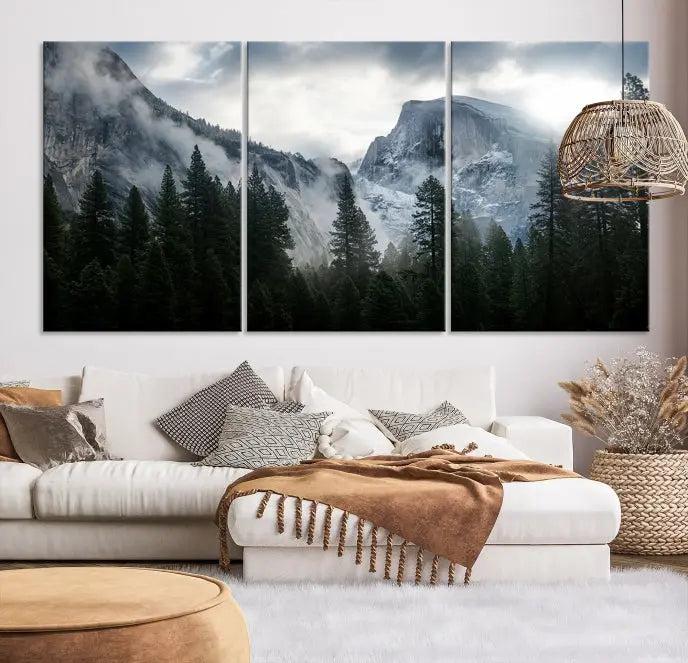 A captivating wall art depicting foggy mountains and the iconic El Capitan from Yosemite National Park graces the wall, infusing the living room with a natural touch.