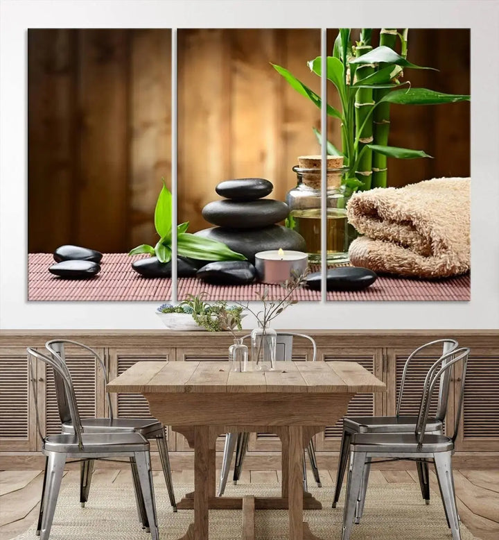 The Zen Serenity Triptych Canvas Art adorns the wall, featuring a pink lotus flower, balancing stones, towels, and bamboo.