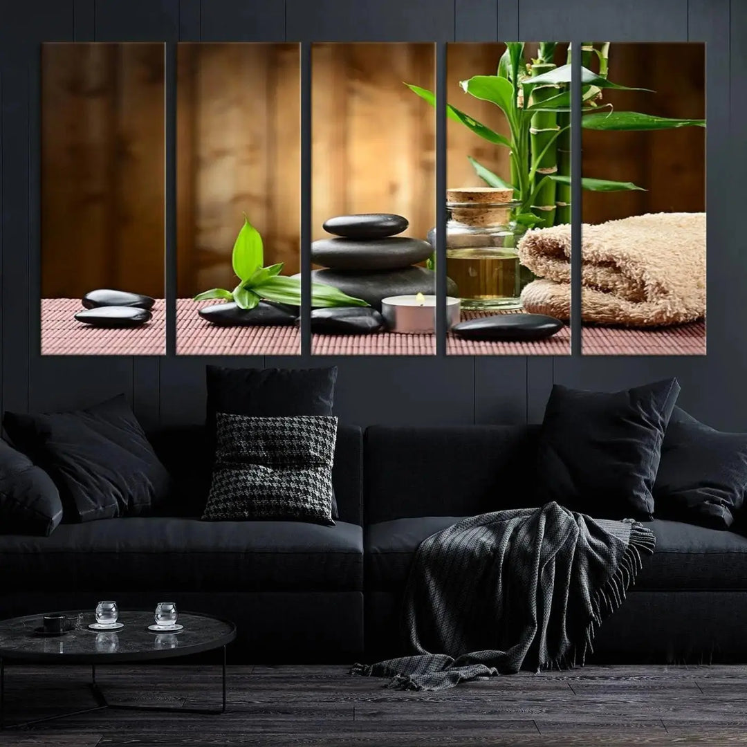 The Zen Serenity Triptych Canvas Art adorns the wall, featuring a pink lotus flower, balancing stones, towels, and bamboo.