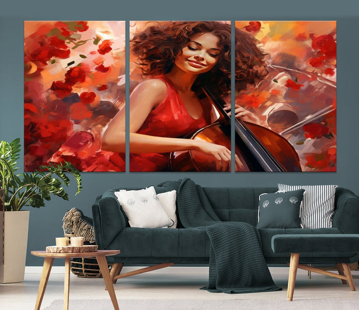 The "Abstract African American Musician Woman Playing the Cello" is a stunning three-panel piece presented on a gallery-wrapped, museum-quality canvas. It depicts a woman in red playing a cello amidst abstract red flowers. The artwork features a UV-protective coating to preserve its vibrant beauty when mounted on a white wall.