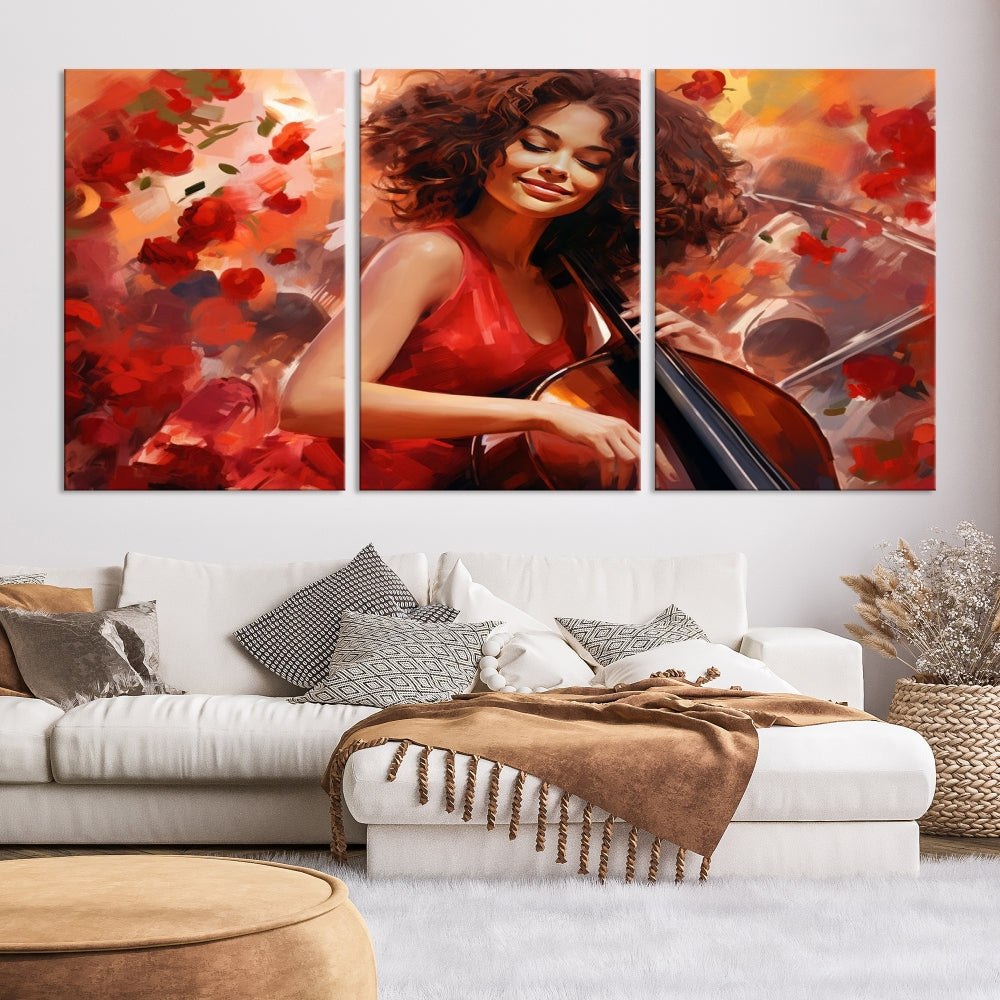 The "Abstract African American Musician Woman Playing the Cello" is a stunning three-panel piece presented on a gallery-wrapped, museum-quality canvas. It depicts a woman in red playing a cello amidst abstract red flowers. The artwork features a UV-protective coating to preserve its vibrant beauty when mounted on a white wall.