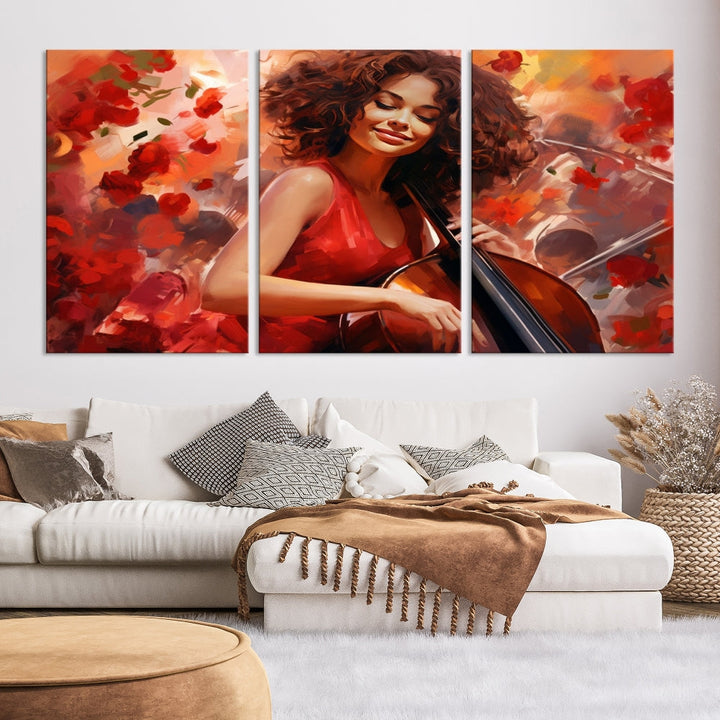 The "Abstract African American Musician Woman Playing the Cello" is a stunning three-panel piece presented on a gallery-wrapped, museum-quality canvas. It depicts a woman in red playing a cello amidst abstract red flowers. The artwork features a UV-protective coating to preserve its vibrant beauty when mounted on a white wall.