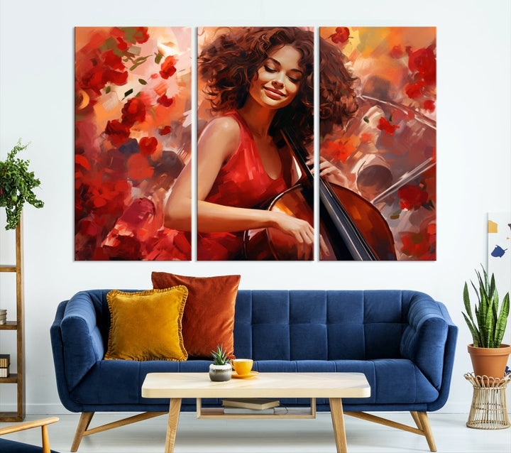 The "Abstract African American Musician Woman Playing the Cello" is a stunning three-panel piece presented on a gallery-wrapped, museum-quality canvas. It depicts a woman in red playing a cello amidst abstract red flowers. The artwork features a UV-protective coating to preserve its vibrant beauty when mounted on a white wall.