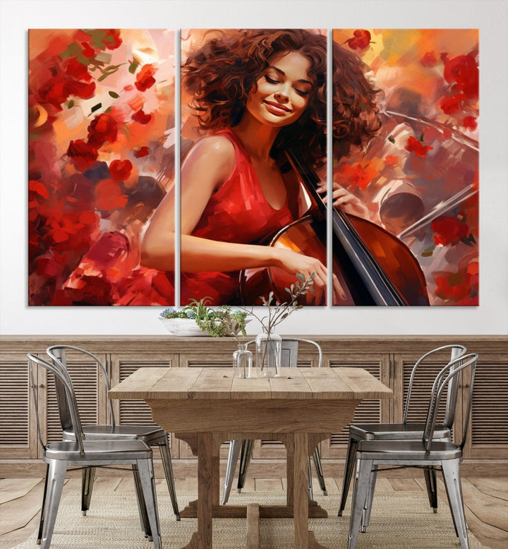 The "Abstract African American Musician Woman Playing the Cello" is a stunning three-panel piece presented on a gallery-wrapped, museum-quality canvas. It depicts a woman in red playing a cello amidst abstract red flowers. The artwork features a UV-protective coating to preserve its vibrant beauty when mounted on a white wall.