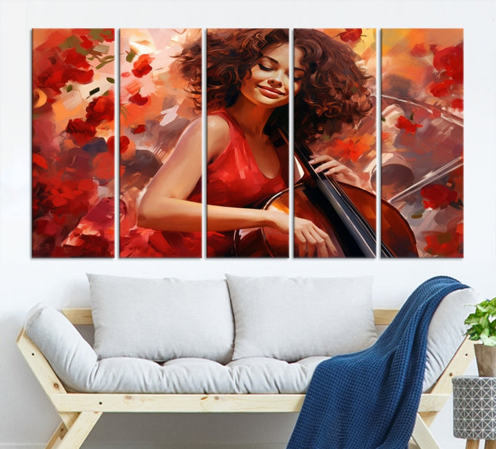 The "Abstract African American Musician Woman Playing the Cello" is a stunning three-panel piece presented on a gallery-wrapped, museum-quality canvas. It depicts a woman in red playing a cello amidst abstract red flowers. The artwork features a UV-protective coating to preserve its vibrant beauty when mounted on a white wall.