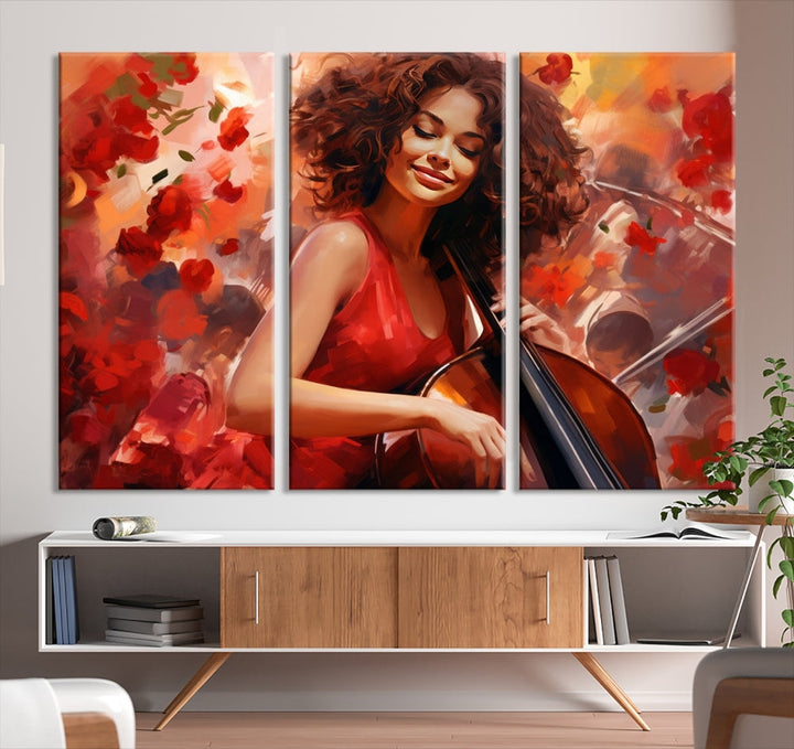 The "Abstract African American Musician Woman Playing the Cello" is a stunning three-panel piece presented on a gallery-wrapped, museum-quality canvas. It depicts a woman in red playing a cello amidst abstract red flowers. The artwork features a UV-protective coating to preserve its vibrant beauty when mounted on a white wall.