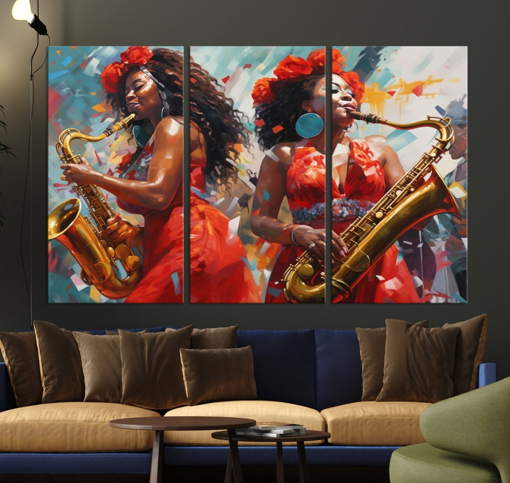 The "Abstract African American Saxophonist Musician Women Wall Art" features a three-panel design depicting two women in red dresses playing saxophones. This premium canvas boasts a gallery-quality finish that enhances any living space with its vibrant charm.