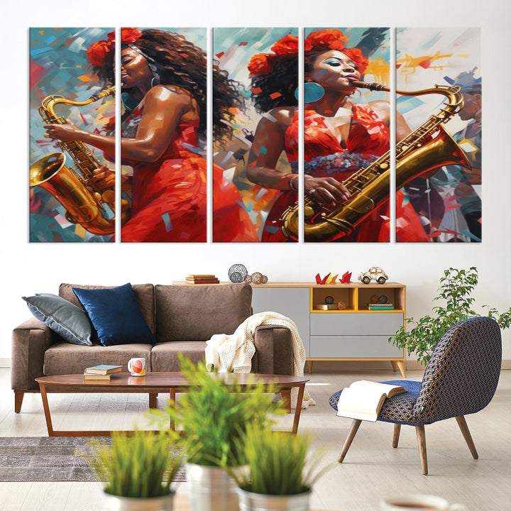 The "Abstract African American Saxophonist Musician Women Wall Art" features a three-panel design depicting two women in red dresses playing saxophones. This premium canvas boasts a gallery-quality finish that enhances any living space with its vibrant charm.