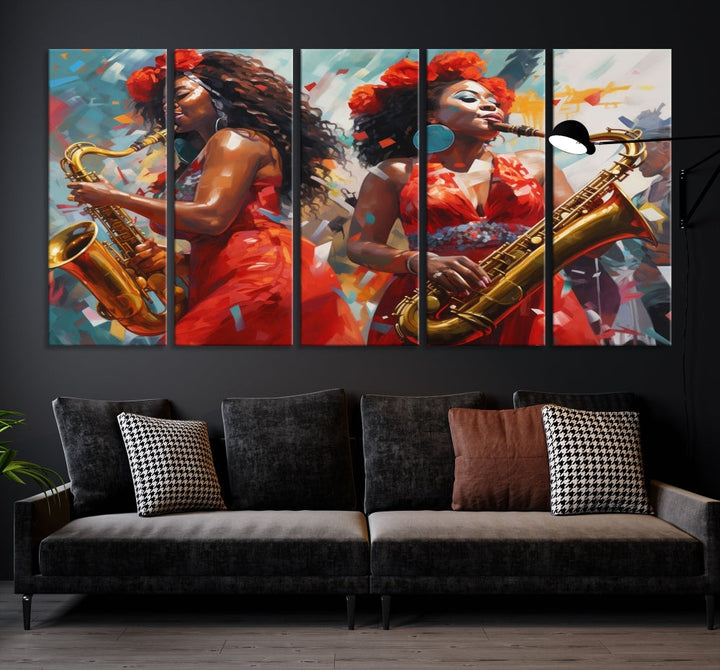 The "Abstract African American Saxophonist Musician Women Wall Art" features a three-panel design depicting two women in red dresses playing saxophones. This premium canvas boasts a gallery-quality finish that enhances any living space with its vibrant charm.