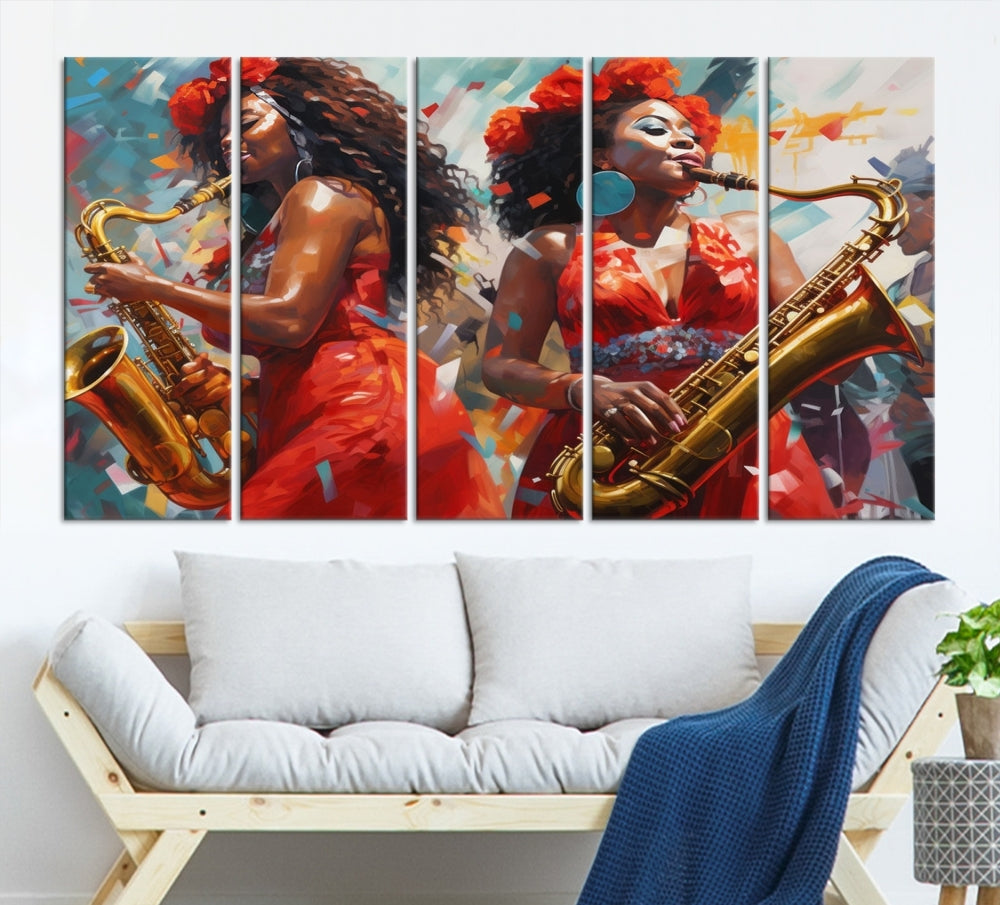 The "Abstract African American Saxophonist Musician Women Wall Art" features a three-panel design depicting two women in red dresses playing saxophones. This premium canvas boasts a gallery-quality finish that enhances any living space with its vibrant charm.