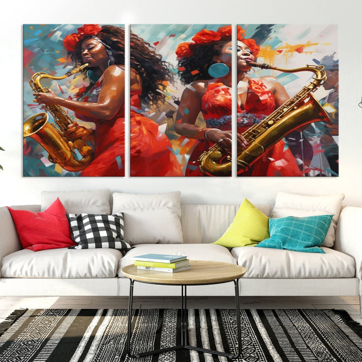 The "Abstract African American Saxophonist Musician Women Wall Art" features a three-panel design depicting two women in red dresses playing saxophones. This premium canvas boasts a gallery-quality finish that enhances any living space with its vibrant charm.