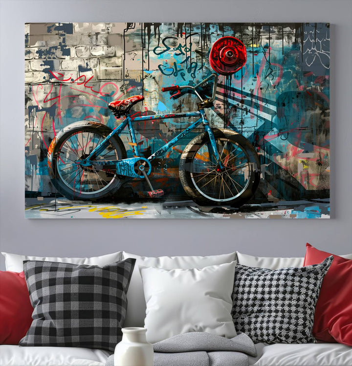 A modern living room features a triptych wall art of an abstract bicycle, designed in a graffiti style on a brick wall. This piece is expertly crafted on the Abstract Bicycle Wall Art Canvas Print, offering a premium canvas that ensures a gallery-quality finish.