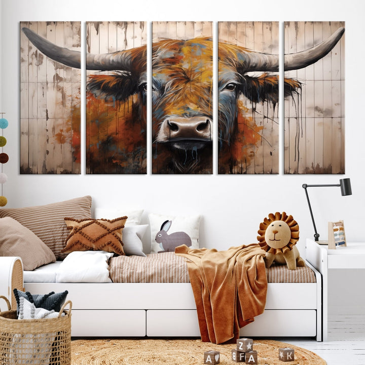 The "Abstract Bull Highland Cow Canvas Wall Art Print," displayed as a three-panel piece, adds vibrant rustic charm to a living room. Its depiction of a large, horned bull beautifully complements the elegance of modern farmhouse decor.