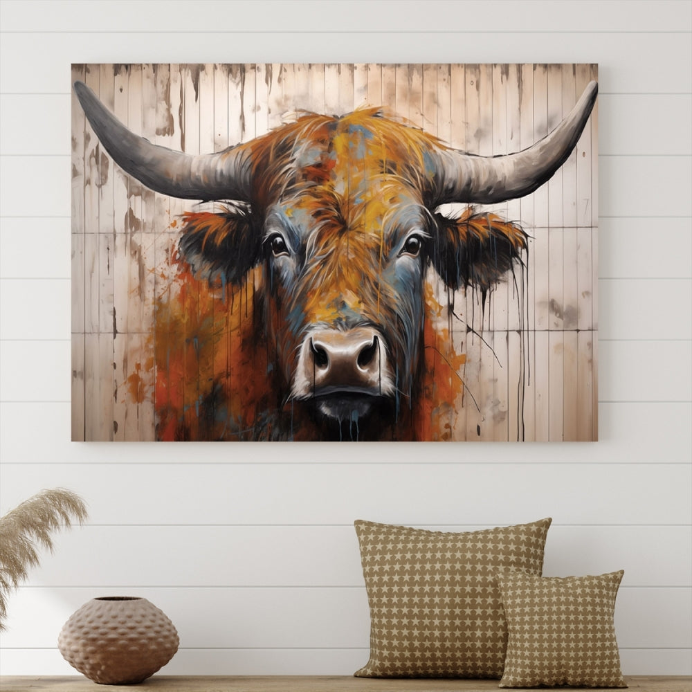 The Abstract Bull Highland Cow Canvas Wall Art Print, featuring its large horns, is mounted on a white wall, introducing a vibrant rustic charm that enhances the modern farmhouse style.