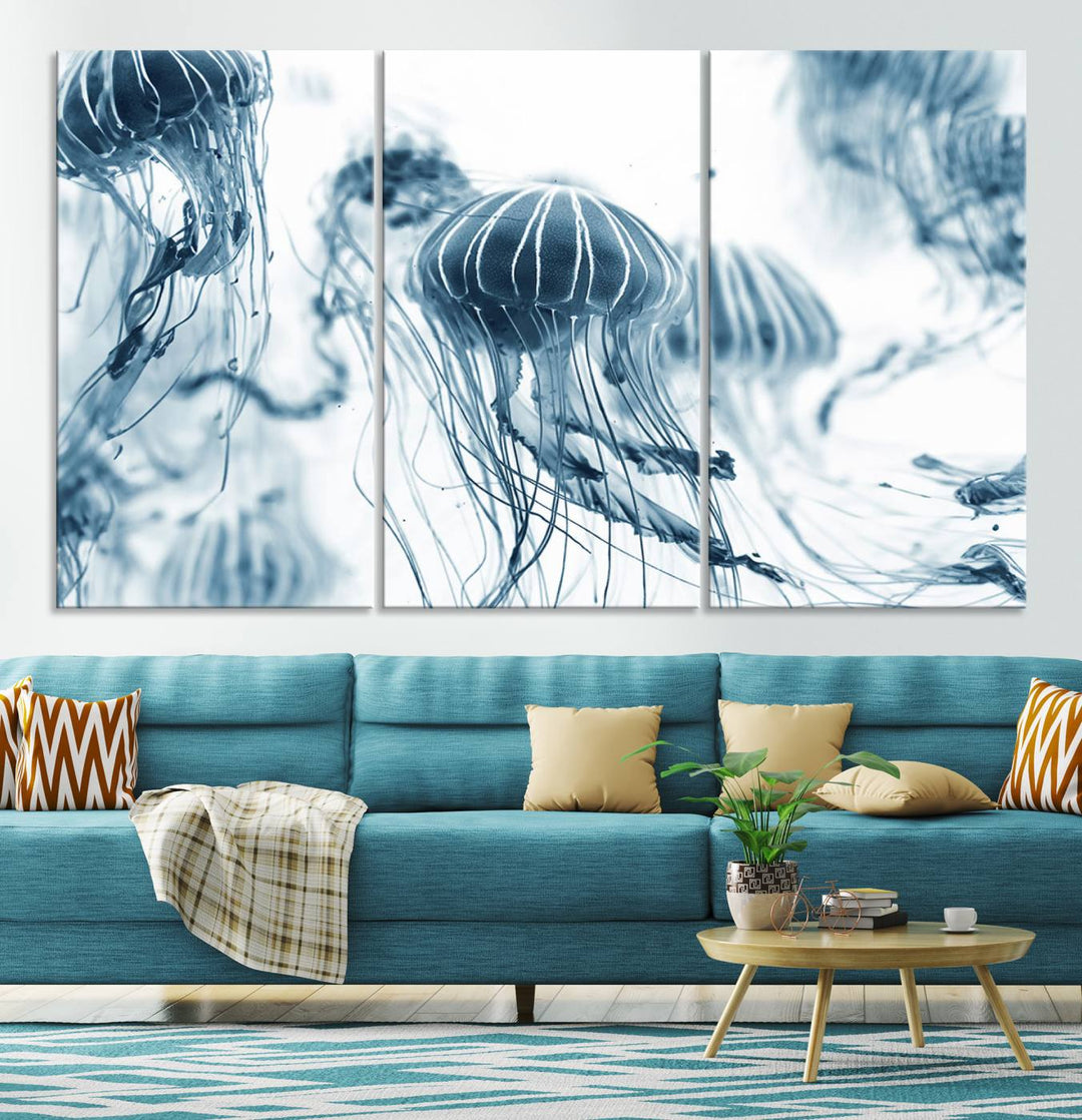 The "Abstract Jellyfish Wall Art Canvas Print" in high resolution is beautifully displayed as a triptych on a dark wall. Experience museum-quality canvas and enjoy free shipping with this stunning piece.