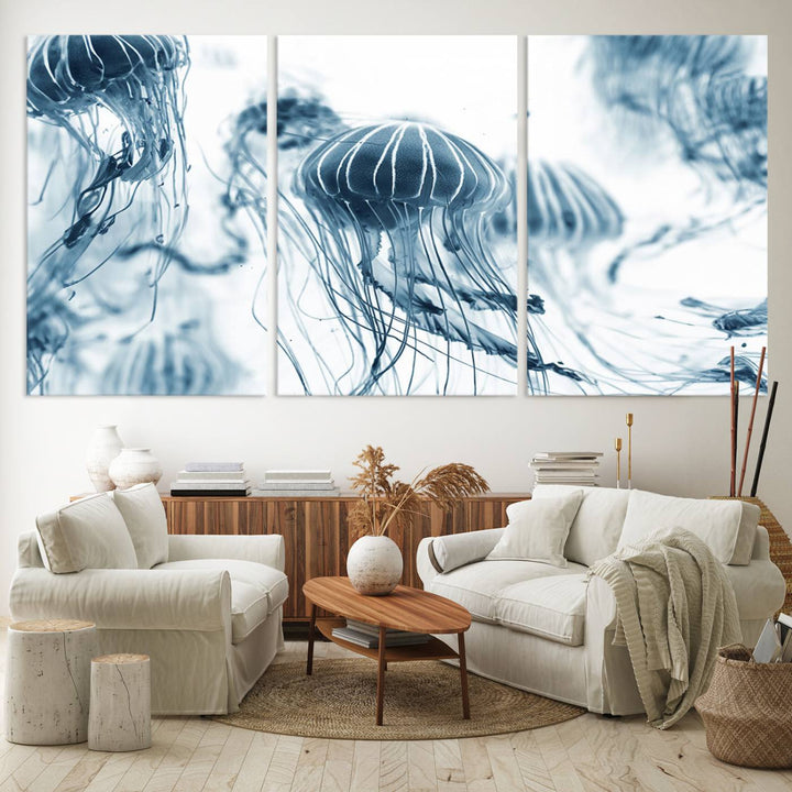 The "Abstract Jellyfish Wall Art Canvas Print" in high resolution is beautifully displayed as a triptych on a dark wall. Experience museum-quality canvas and enjoy free shipping with this stunning piece.