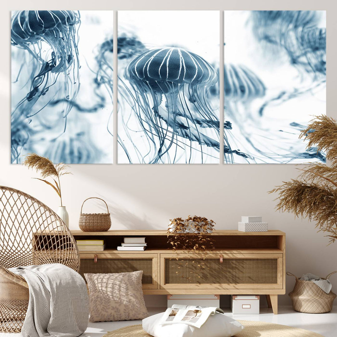 The "Abstract Jellyfish Wall Art Canvas Print" in high resolution is beautifully displayed as a triptych on a dark wall. Experience museum-quality canvas and enjoy free shipping with this stunning piece.