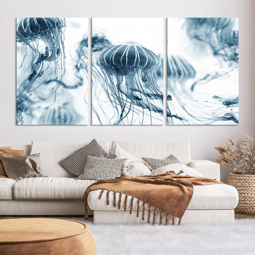 The "Abstract Jellyfish Wall Art Canvas Print" in high resolution is beautifully displayed as a triptych on a dark wall. Experience museum-quality canvas and enjoy free shipping with this stunning piece.