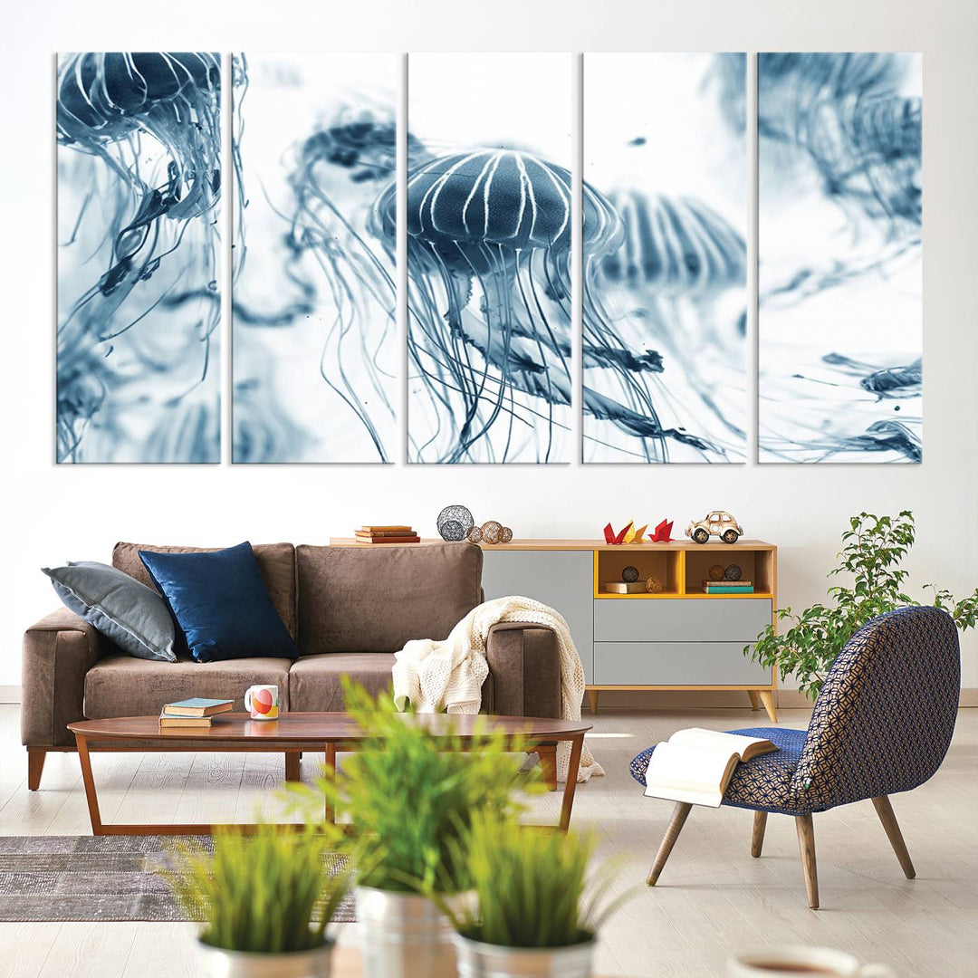 The "Abstract Jellyfish Wall Art Canvas Print" in high resolution is beautifully displayed as a triptych on a dark wall. Experience museum-quality canvas and enjoy free shipping with this stunning piece.