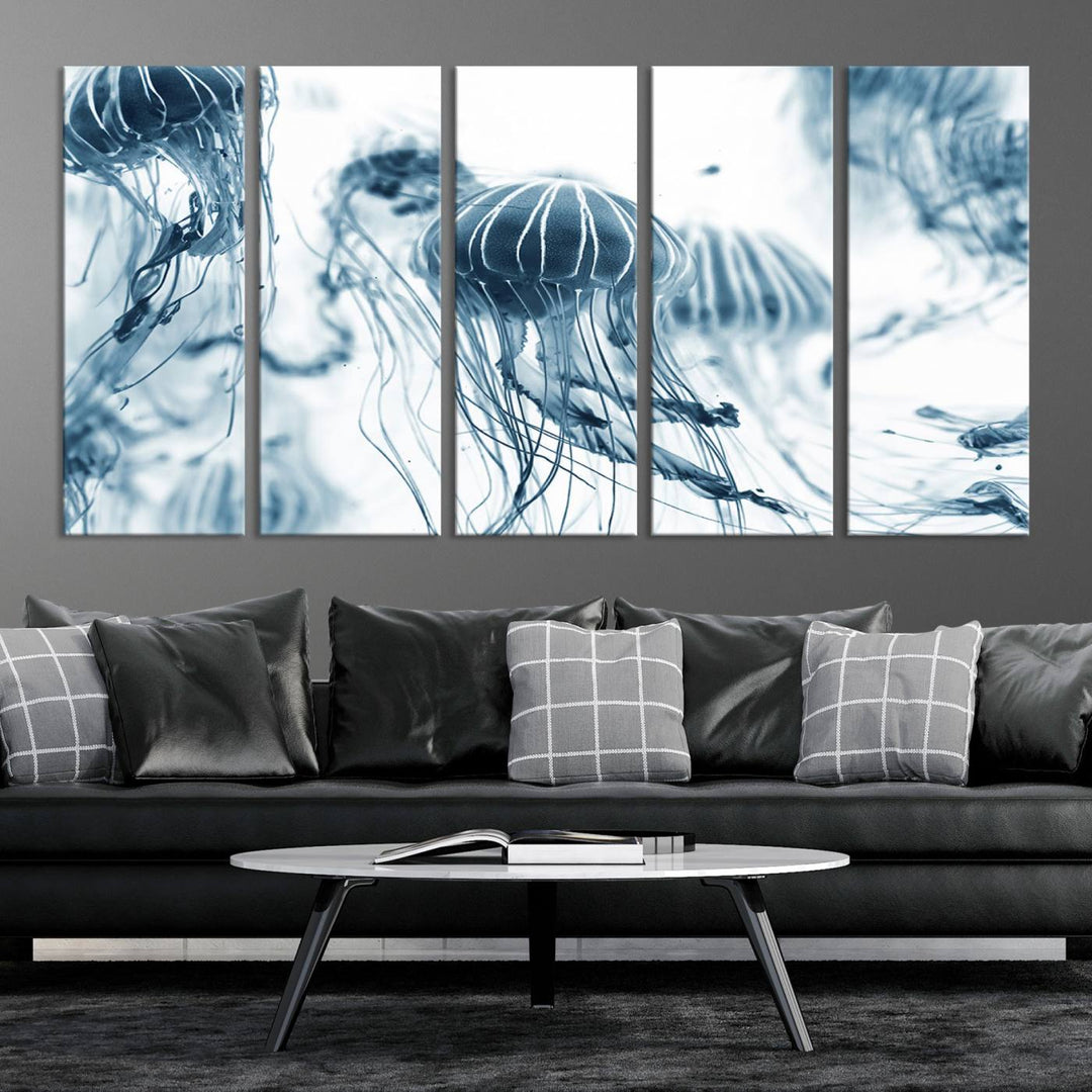 The "Abstract Jellyfish Wall Art Canvas Print" in high resolution is beautifully displayed as a triptych on a dark wall. Experience museum-quality canvas and enjoy free shipping with this stunning piece.