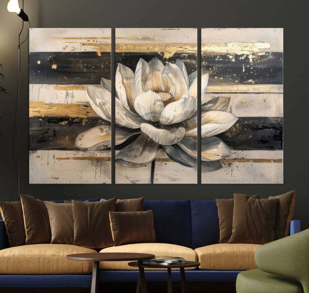 The Abstract Lotus Flower Wall Art Canvas Print, designed for a meditation or yoga room, brings elegance to any space with its stunning three-panel depiction of a lotus flower featuring gold accents. It is an exemplary piece of modern luxury.