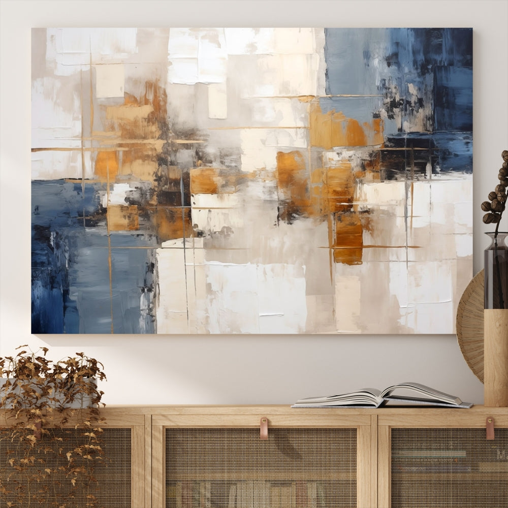 Abstract Print Wall Art Canvas Artwork with blue, white, and gold hues is showcased. Crafted on museum-quality canvases, this artwork comes ready to hang and includes a UV-protective coating to preserve its vibrant colors.