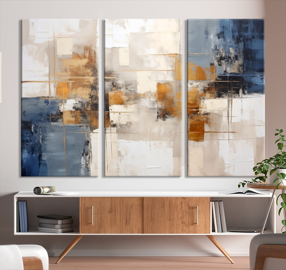 Abstract Print Wall Art Canvas Artwork with blue, white, and gold hues is showcased. Crafted on museum-quality canvases, this artwork comes ready to hang and includes a UV-protective coating to preserve its vibrant colors.