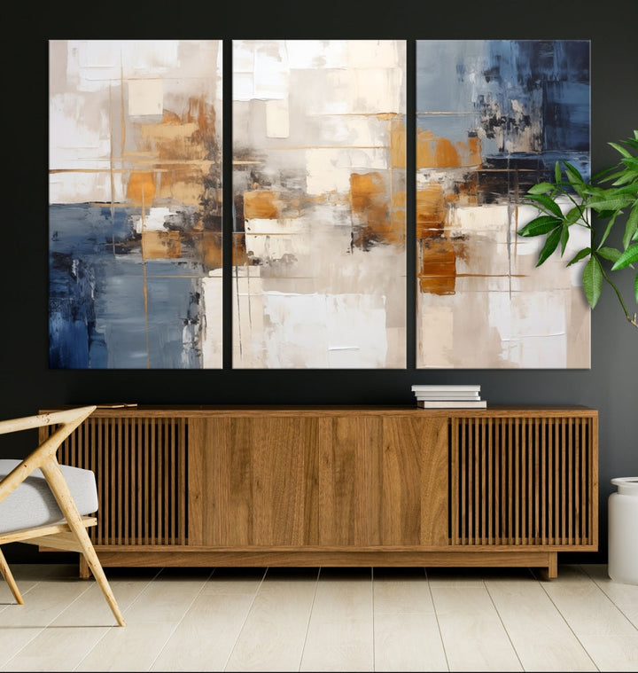 Abstract Print Wall Art Canvas Artwork with blue, white, and gold hues is showcased. Crafted on museum-quality canvases, this artwork comes ready to hang and includes a UV-protective coating to preserve its vibrant colors.