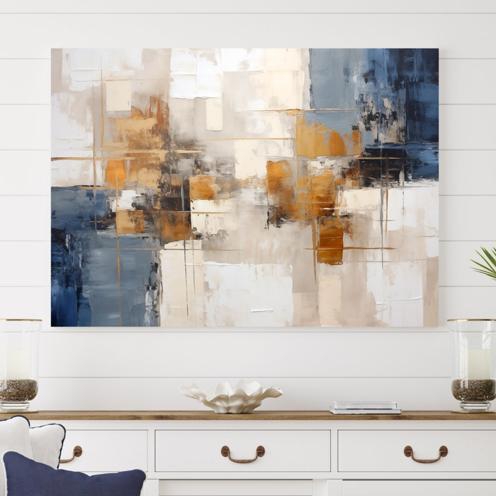 Abstract Print Wall Art Canvas Artwork with blue, white, and gold hues is showcased. Crafted on museum-quality canvases, this artwork comes ready to hang and includes a UV-protective coating to preserve its vibrant colors.