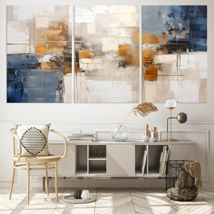 Abstract Print Wall Art Canvas Artwork with blue, white, and gold hues is showcased. Crafted on museum-quality canvases, this artwork comes ready to hang and includes a UV-protective coating to preserve its vibrant colors.