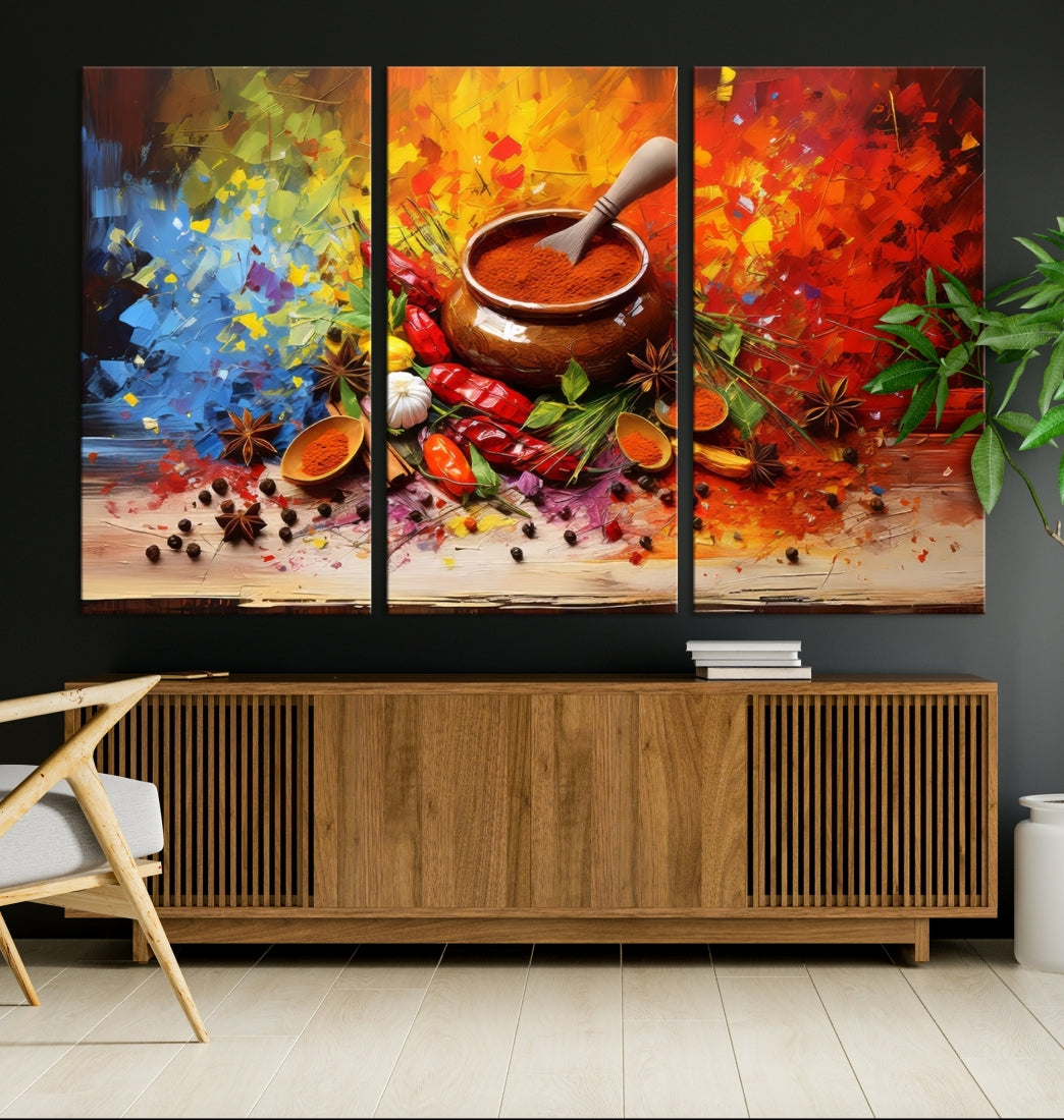 The Abstract Spoonful of Spice Art Print Kitchen Herbs and Spices, a triptych featuring colorful spices and a wooden bowl printed on museum-quality canvas, is ready to hang.