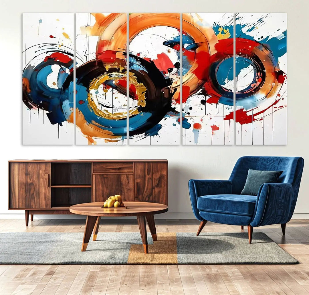 The Abstract Wall Art Rings Canvas Print, with its bold and colorful circular strokes, adorns the wall, epitomizing contemporary design.