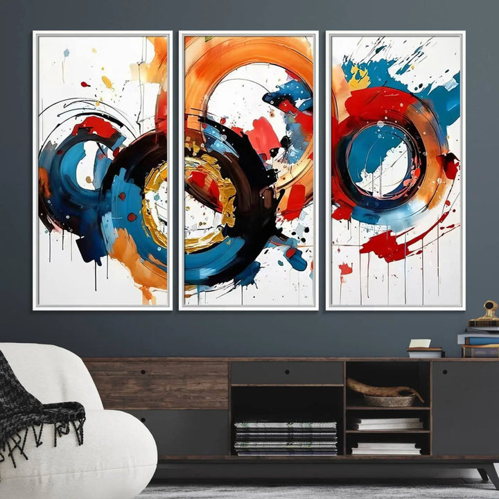 The Abstract Wall Art Rings Canvas Print, with its bold and colorful circular strokes, adorns the wall, epitomizing contemporary design.