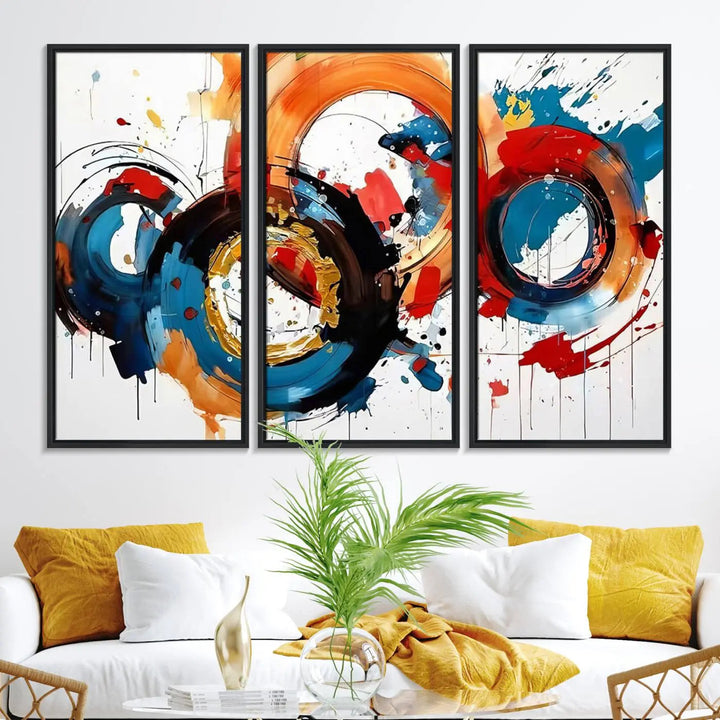 The Abstract Wall Art Rings Canvas Print, with its bold and colorful circular strokes, adorns the wall, epitomizing contemporary design.