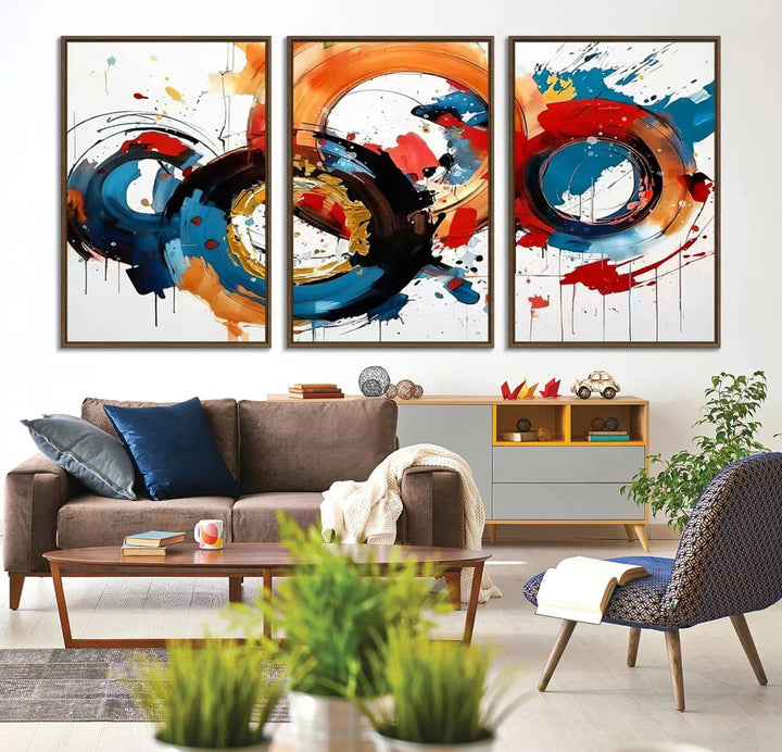 The Abstract Wall Art Rings Canvas Print, with its bold and colorful circular strokes, adorns the wall, epitomizing contemporary design.