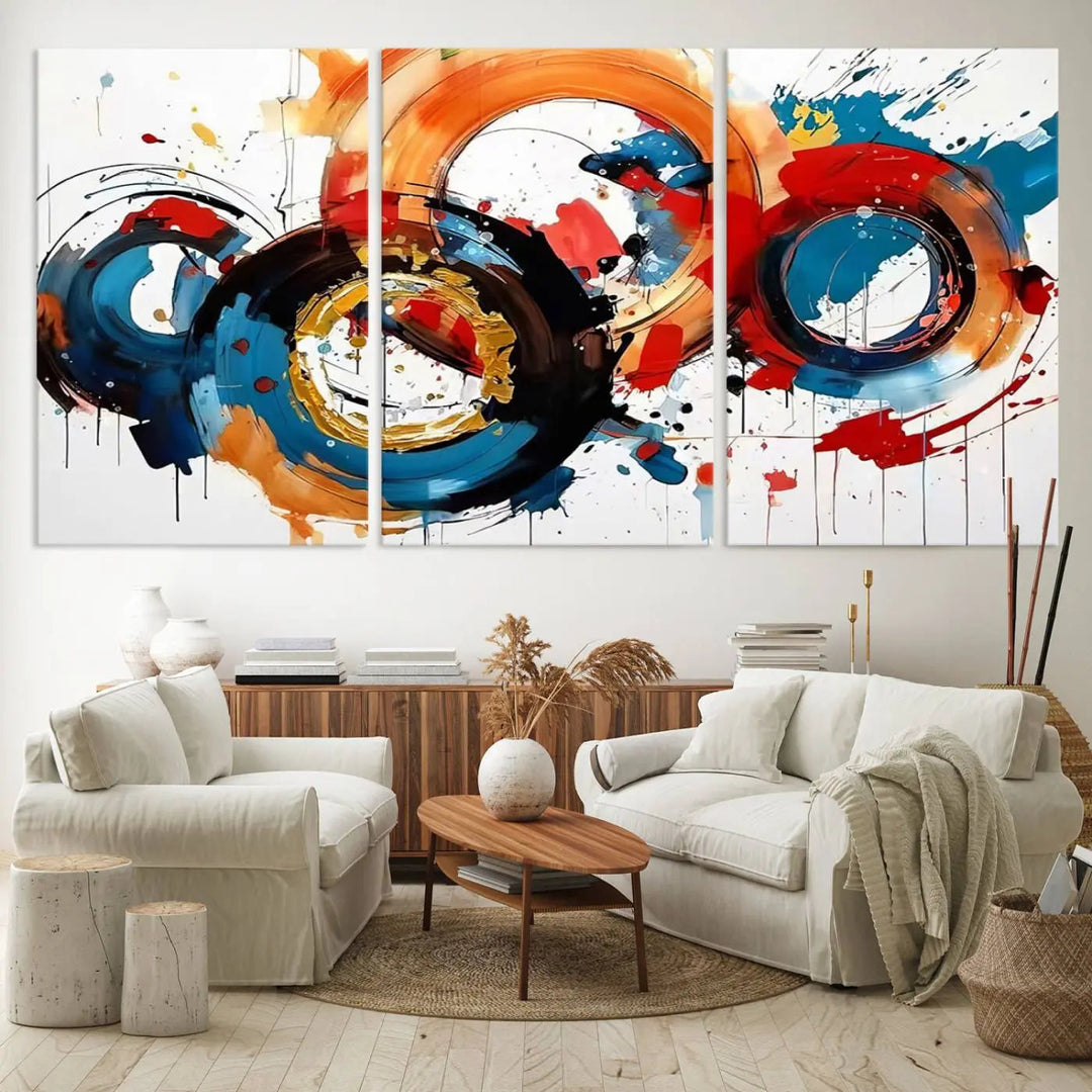 The Abstract Wall Art Rings Canvas Print, with its bold and colorful circular strokes, adorns the wall, epitomizing contemporary design.