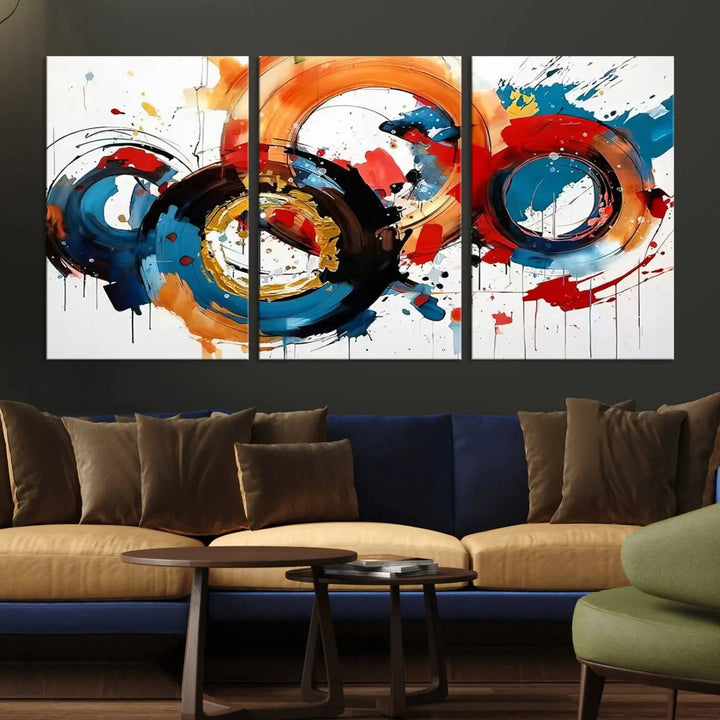 The Abstract Wall Art Rings Canvas Print, with its bold and colorful circular strokes, adorns the wall, epitomizing contemporary design.