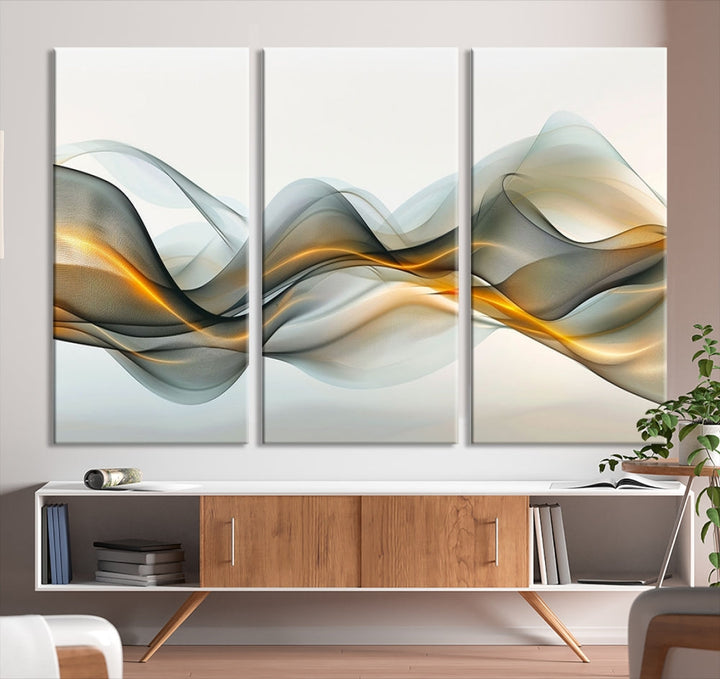 The living room showcases an elegant Abstract Wave Canvas Wall Art – Fluid Contemporary Elegance in Motion – Ready to Hang, featuring swirling blue and golden waves, adding a touch of sophistication to the space.