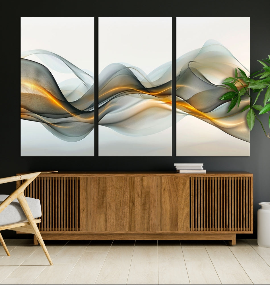 The living room showcases an elegant Abstract Wave Canvas Wall Art – Fluid Contemporary Elegance in Motion – Ready to Hang, featuring swirling blue and golden waves, adding a touch of sophistication to the space.