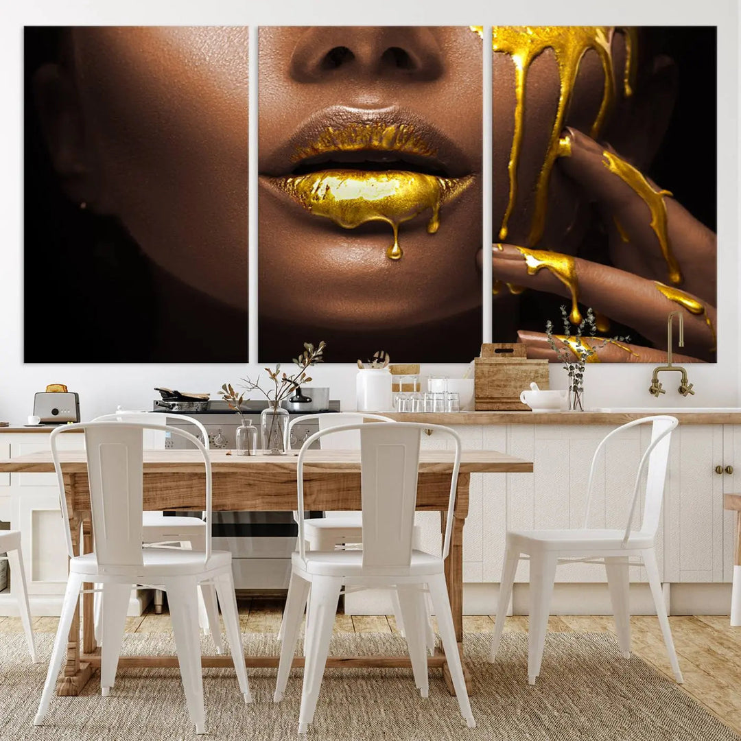 A triptych art display of the African American Art Black Woman Canvas Print, featuring gold-painted lips inspired by fashion and luxury, is elegantly arranged.