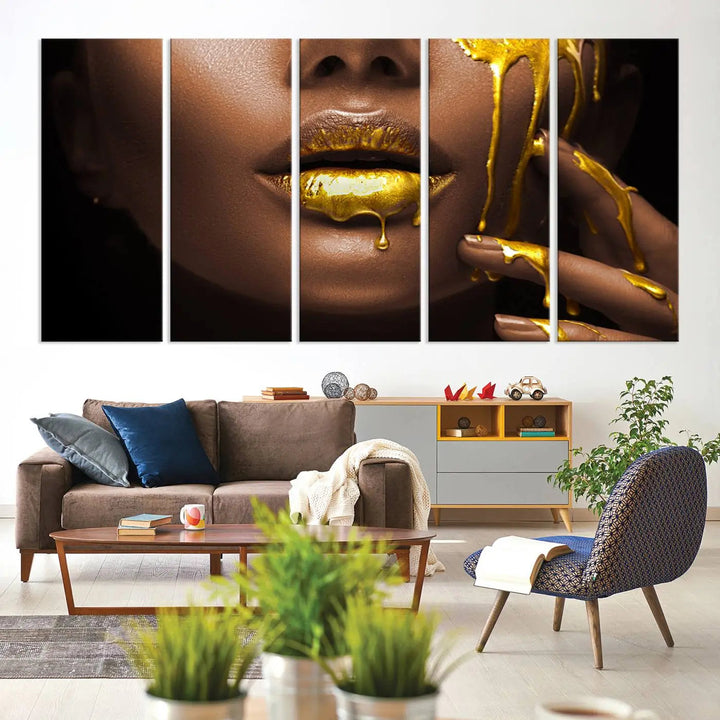 A triptych art display of the African American Art Black Woman Canvas Print, featuring gold-painted lips inspired by fashion and luxury, is elegantly arranged.