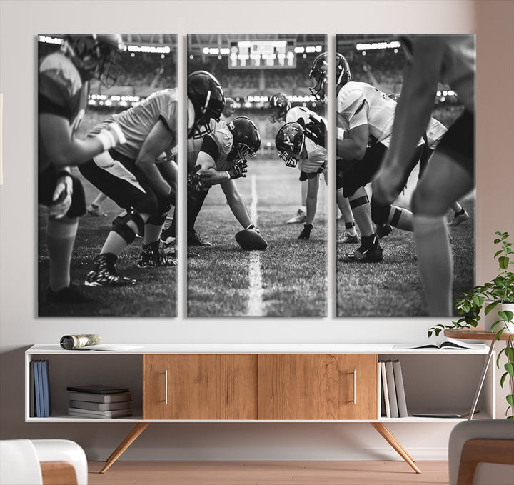 The "American Football Match Wall Art Canvas Print," featuring a black and white photo of a football game, is displayed as a triptych. This artwork is printed on museum-quality canvases and protected with a UV-coating.