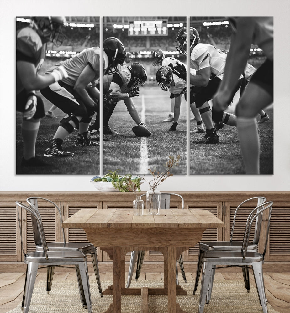 The "American Football Match Wall Art Canvas Print," featuring a black and white photo of a football game, is displayed as a triptych. This artwork is printed on museum-quality canvases and protected with a UV-coating.