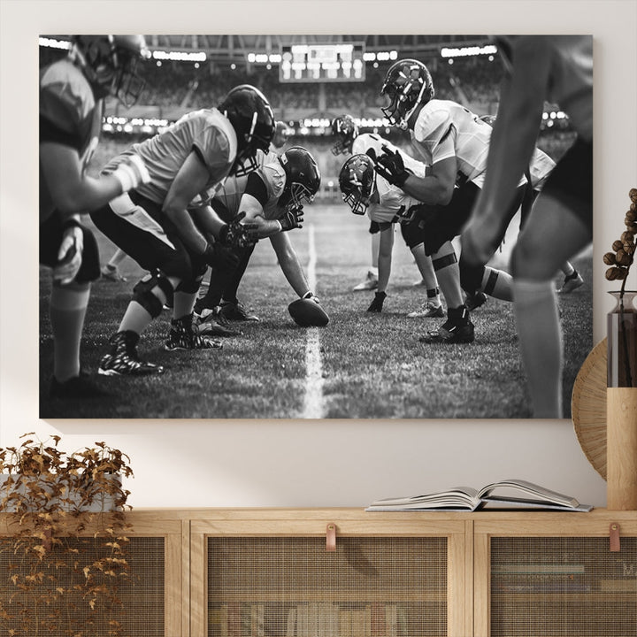 The "American Football Match Wall Art Canvas Print," featuring a black and white photo of a football game, is displayed as a triptych. This artwork is printed on museum-quality canvases and protected with a UV-coating.