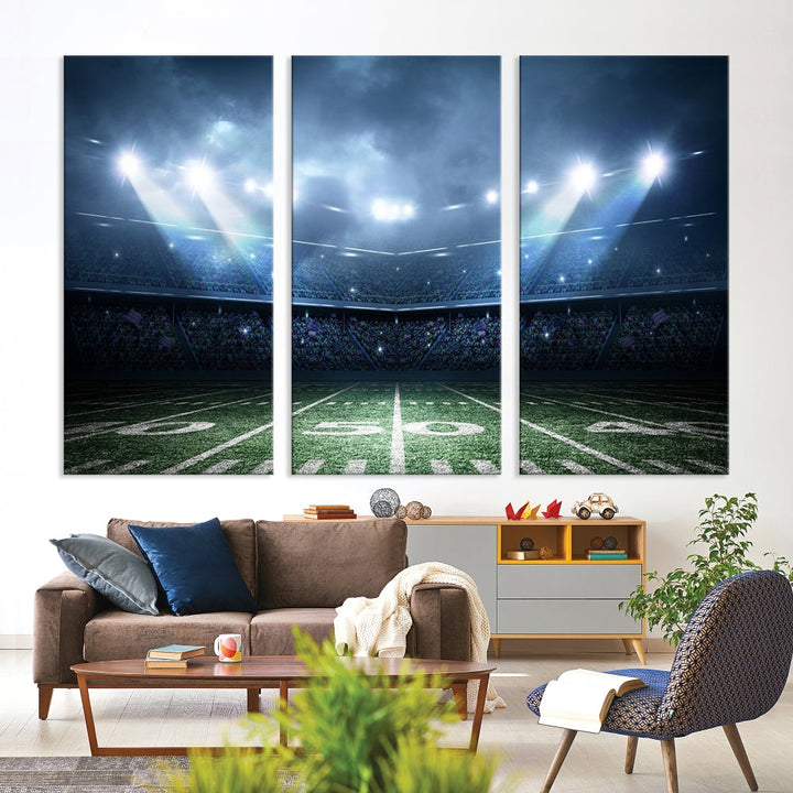 The *American Football Stadium Wall Art Canvas Print*, showcasing a lit football stadium, hangs prominently.